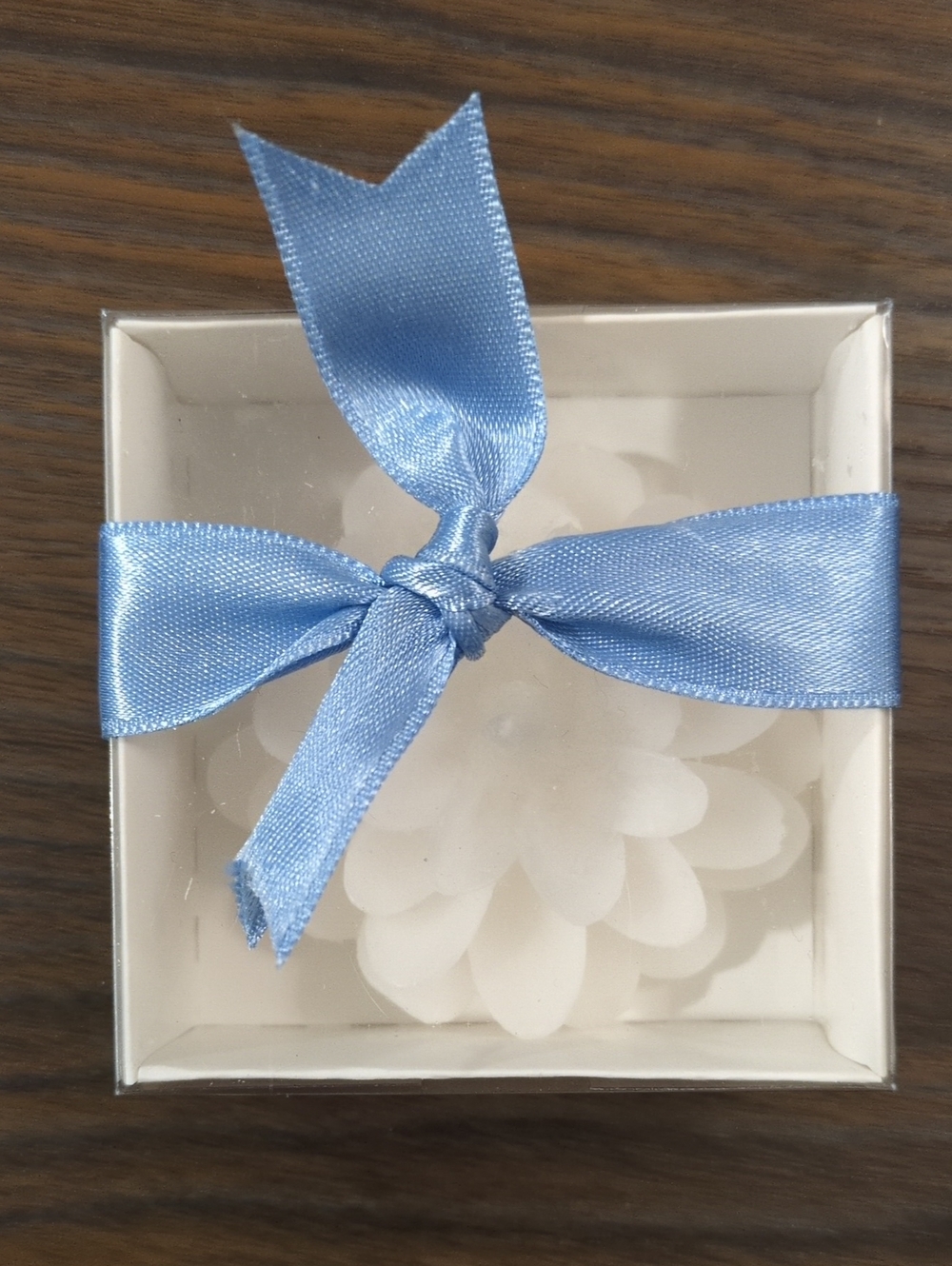 White Lotus Candle with Blue Ribbon Wrap